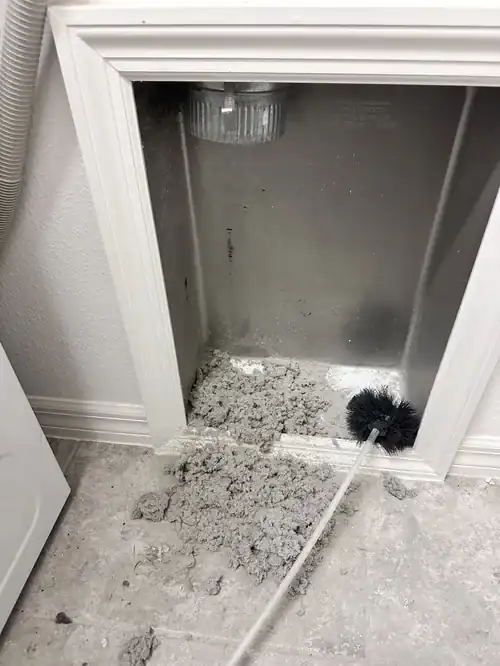 Clean dryer duct interior after lint removal