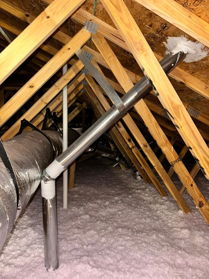 Dryer vent replacement — new code-compliant rigid metal install