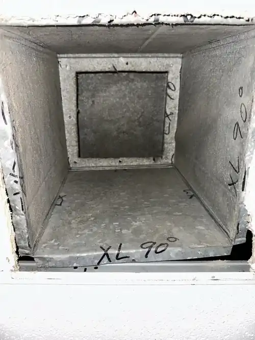 Clean duct opening in wall after professional cleaning